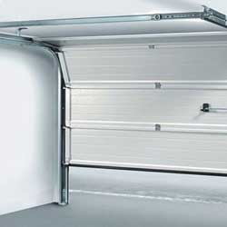 Low Lift Sectional Door for limited headroom industrial applications